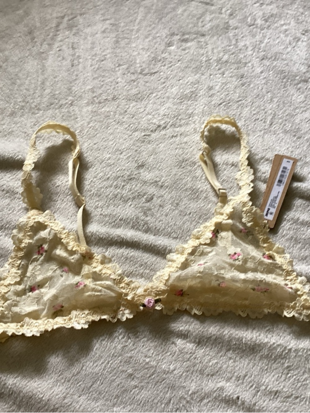 SKIMS Pale Yellow Lace Bralette with Pink Floral Detail